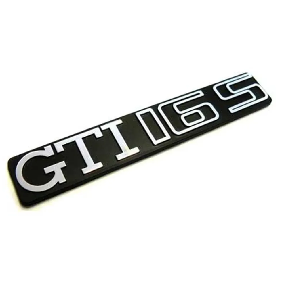Emblème adhésif GTI 16S chromé sur fond noir de tableau de bord pour VW Golf 2 GTI 16S (08/1985-10/1991)
